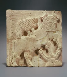 Plaquette met een leeuw die een stier aanvalt, uit Irak, ca. 2000 v.Chr.